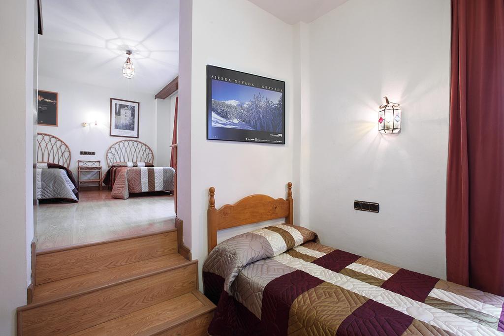 Pension Landazuri Granada Habitación foto
